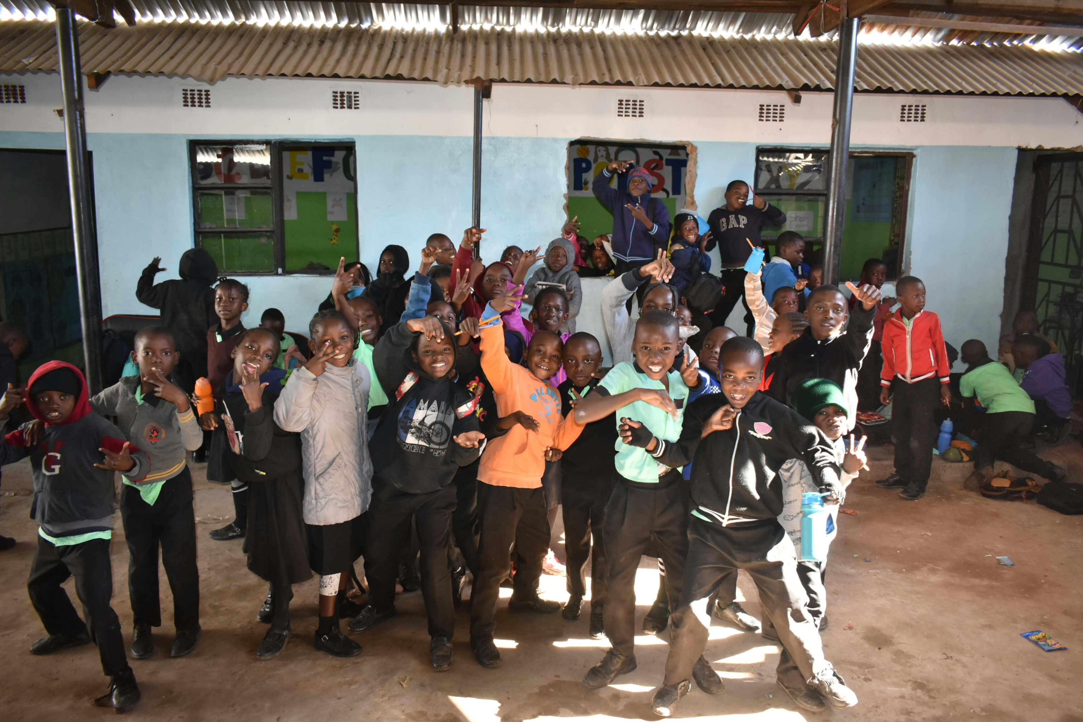 Learners at Determined Primary School seated together in a classroom in Maramba, Livingstone